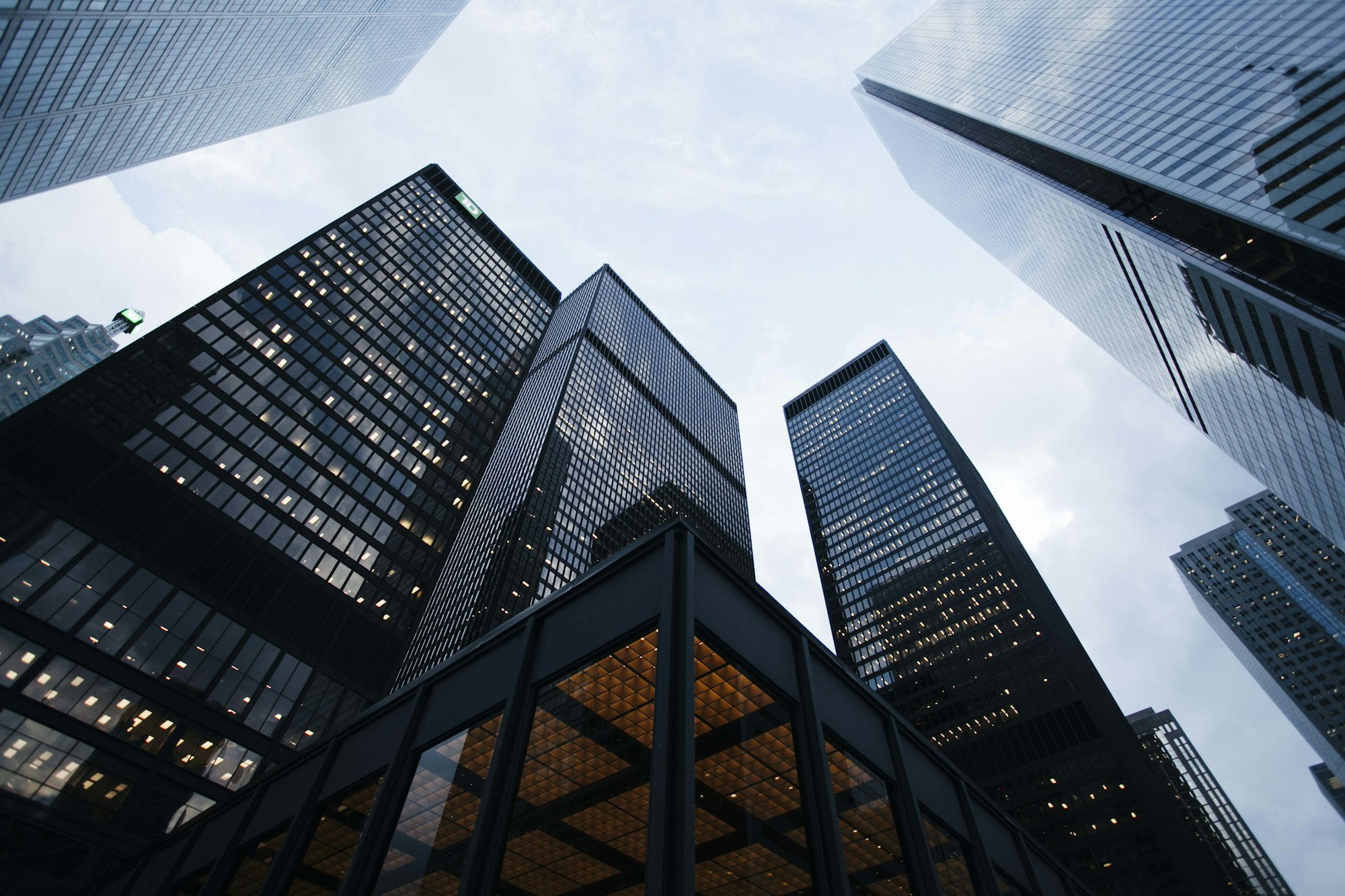 Financial district towers with warm lit interiors